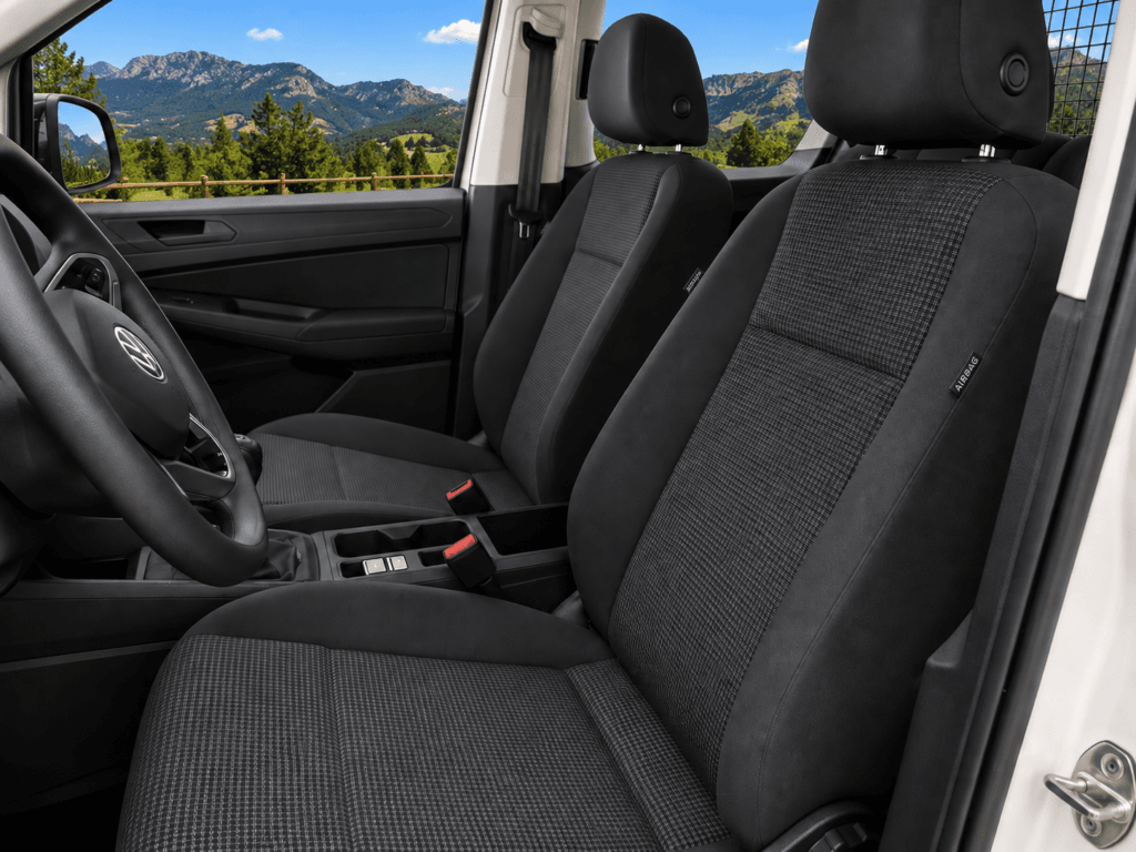 Interior cabina Volkswagen Caddy Origin asientos y volante